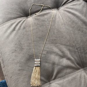 Long gold necklace with gold fringe